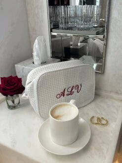 EMBROIDERED TOILETRY POUCH